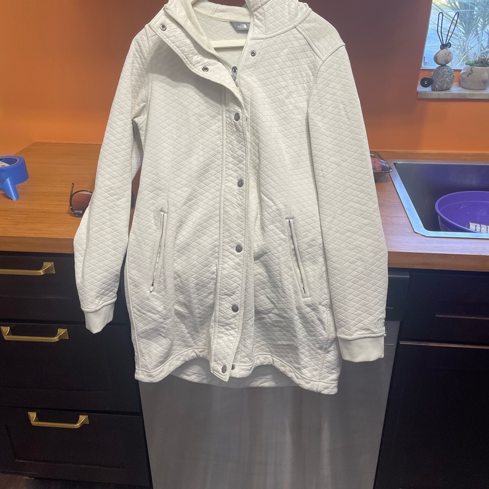 Woman’s White North face jacket size Med.